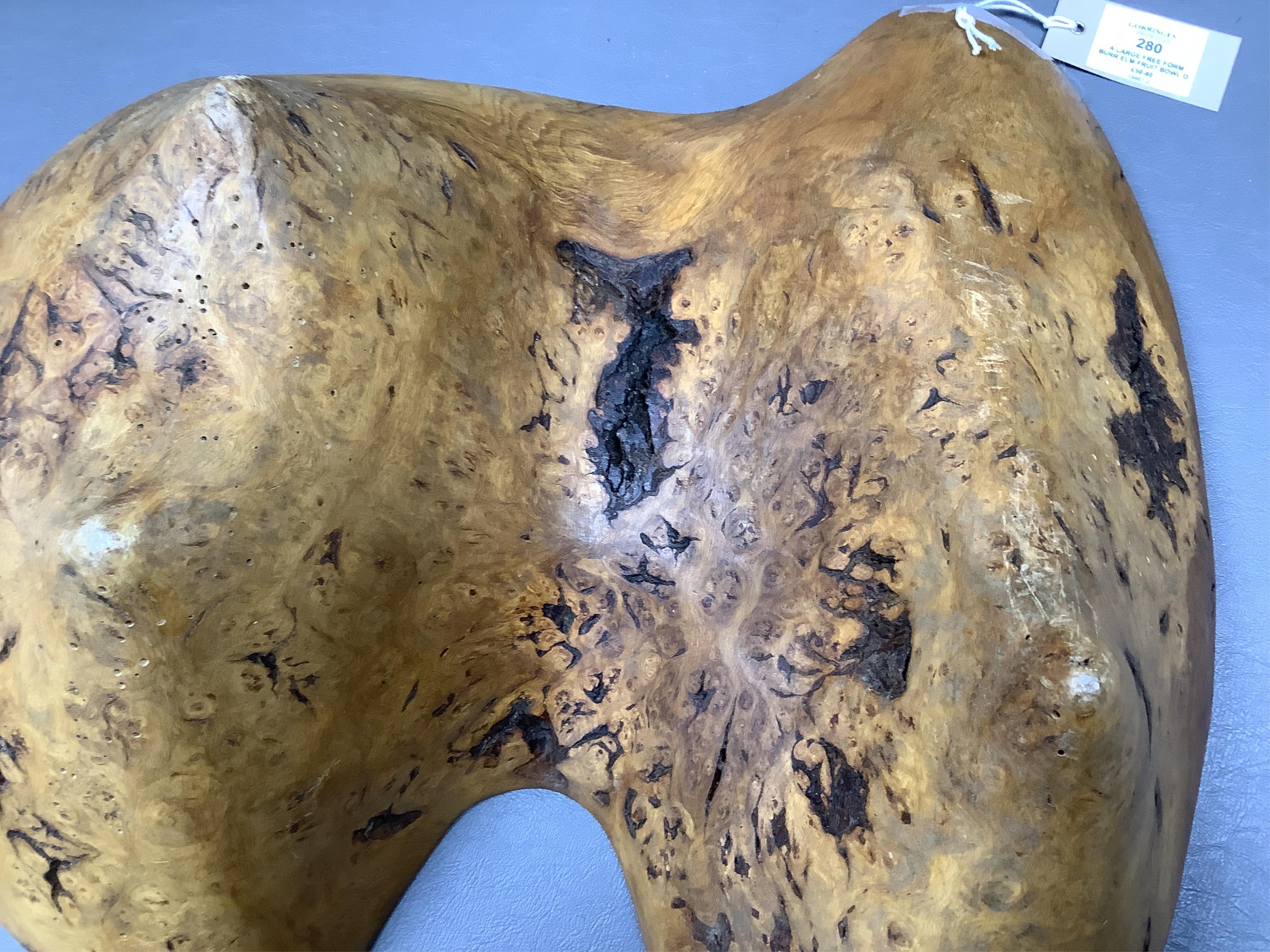 A large free form burr elm fruit bowl or centre dish, 45cm wide